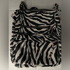 New w/tags Zebra backpack internal & external pockets and addr’l guitar strap